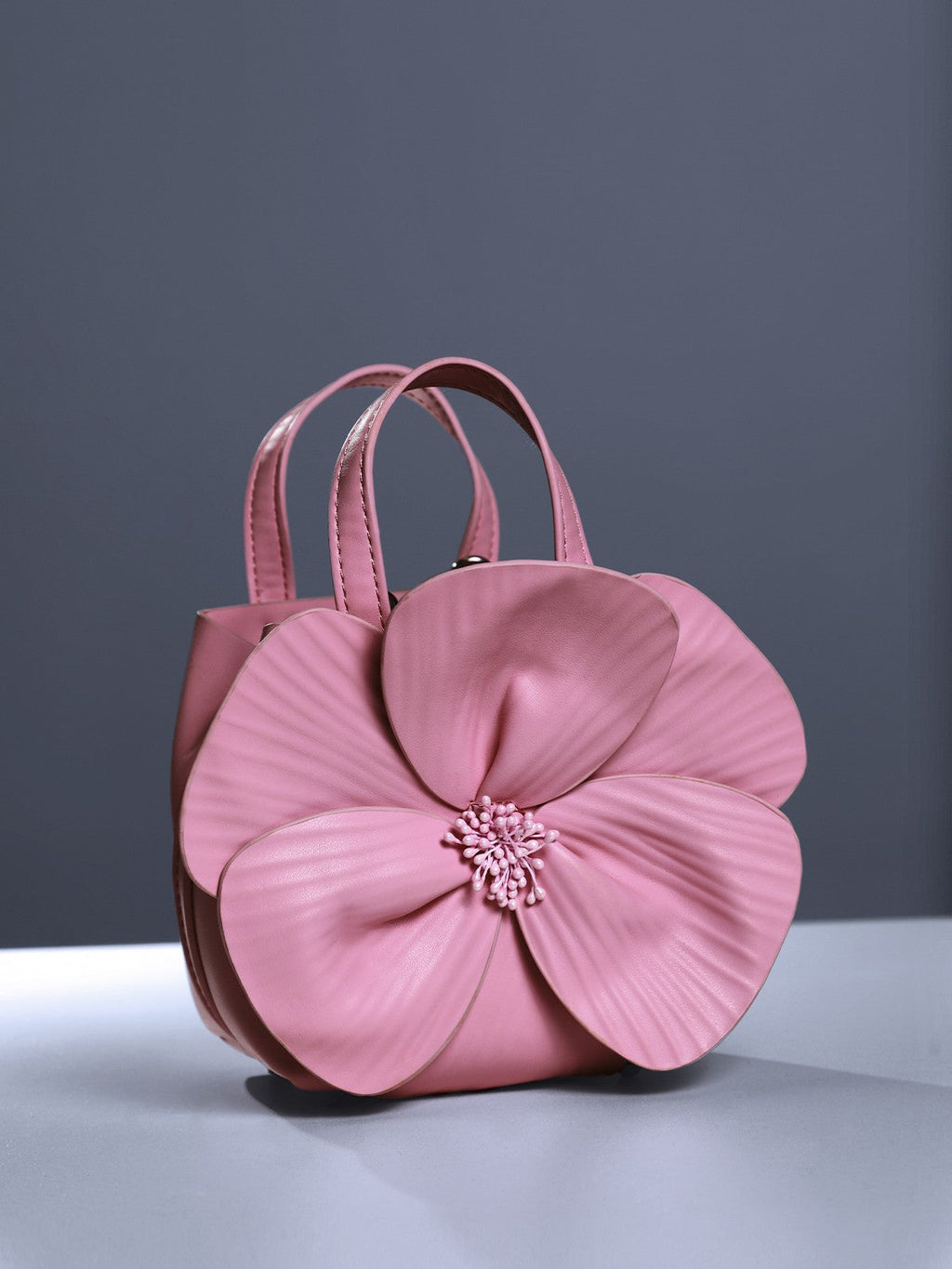Sac en cuir rose à motif floral
