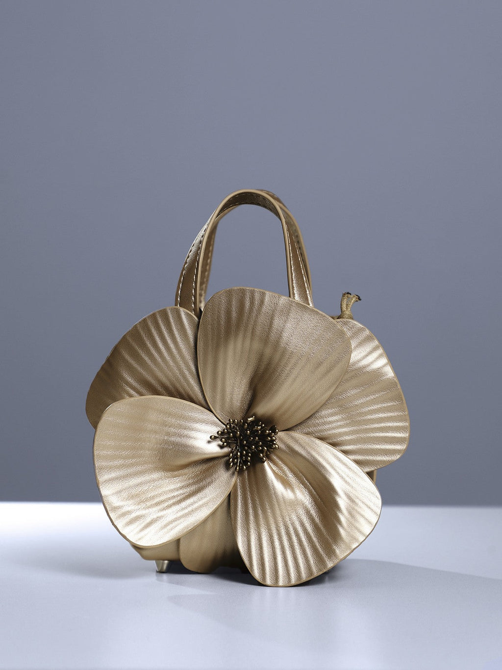Sac à fleurs en cuir doré Acsah