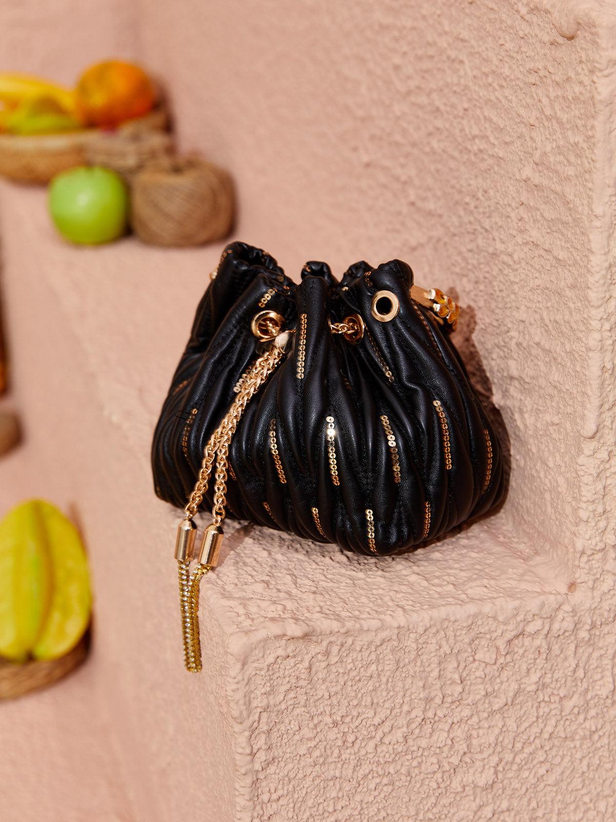 Sac seau Mattea en cuir noir à sequins