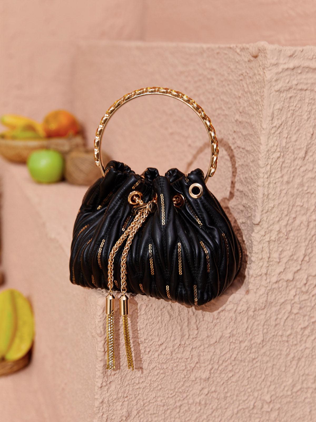 Sac seau Mattea en cuir noir à sequins