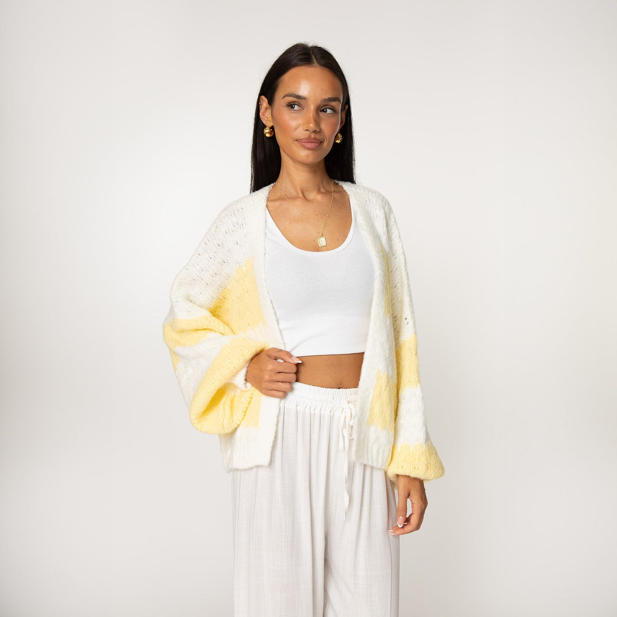 Cardigan oversize à rayures audacieuses