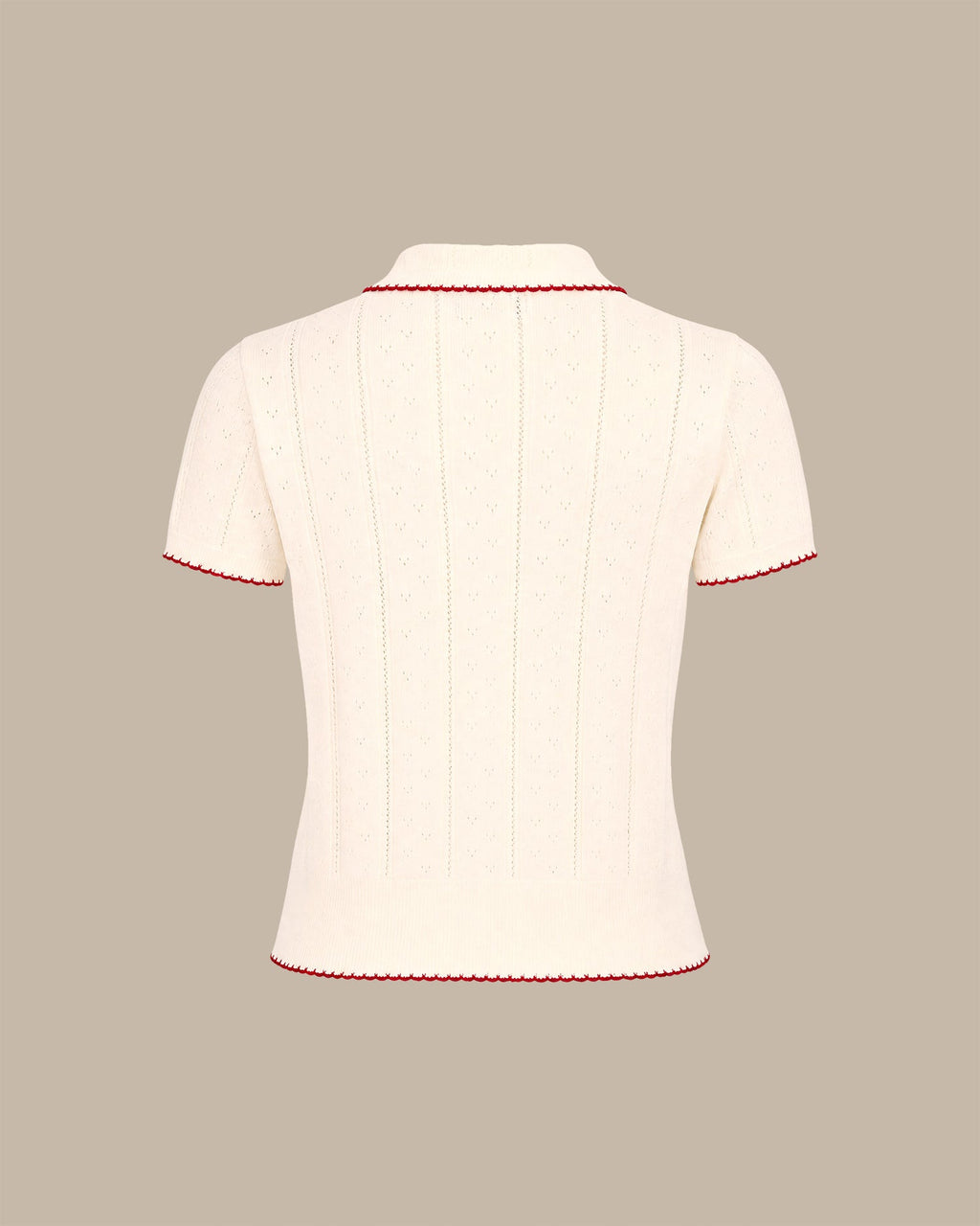 Pull en maille couleur abricot à col contrastant