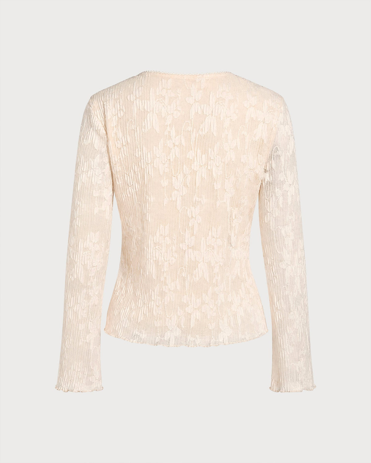T-shirt en maille couleur abricot avec boutons et motif floral