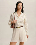 Blouse à col fleuri couleur abricot
