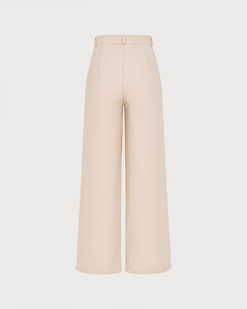 Pantalon droit couleur abricot avec boutons et poches