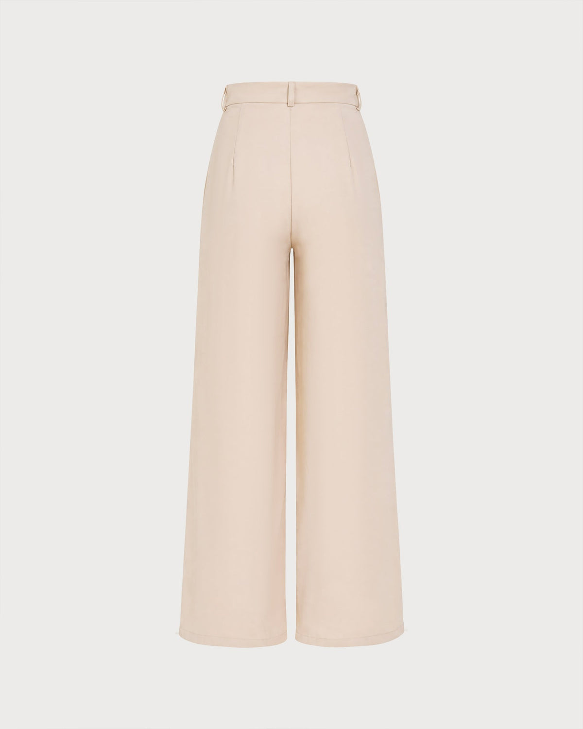 Pantalon droit couleur abricot avec boutons et poches