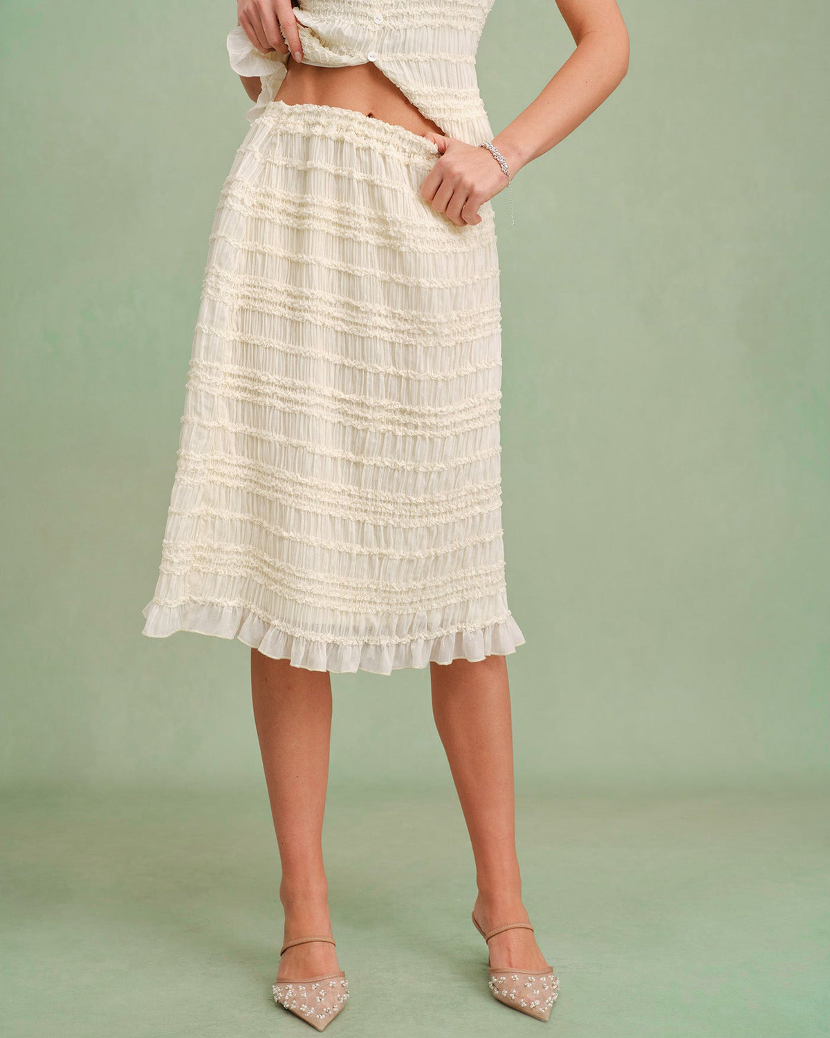 Jupe midi couleur abricot à taille élastique et froncée