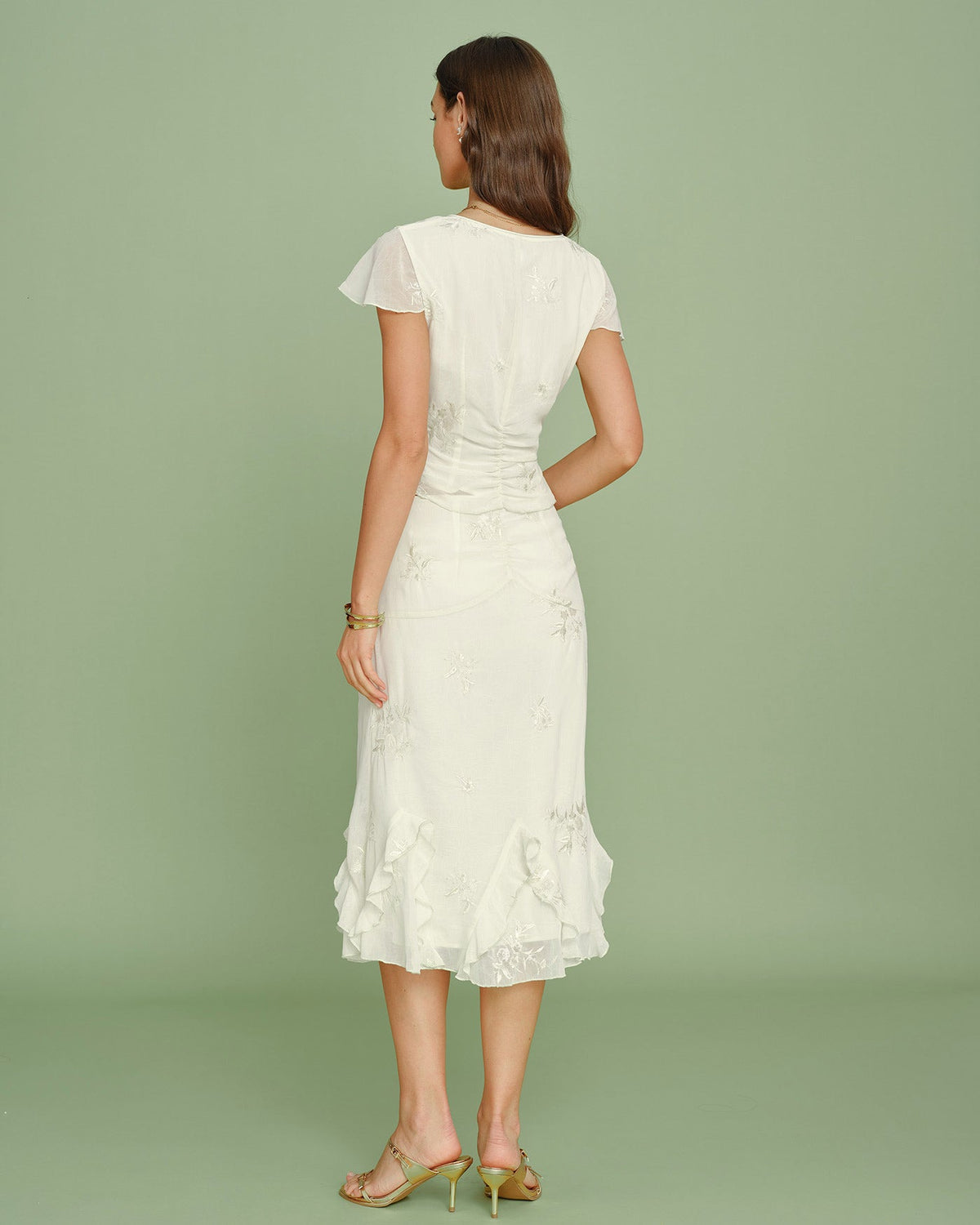 Jupe midi couleur abricot avec broderies et volants