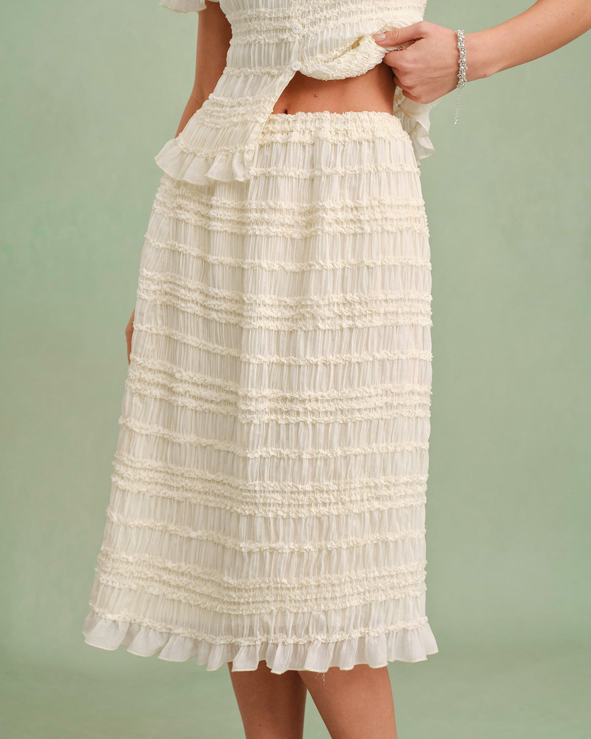 Jupe midi couleur abricot à taille élastique et froncée