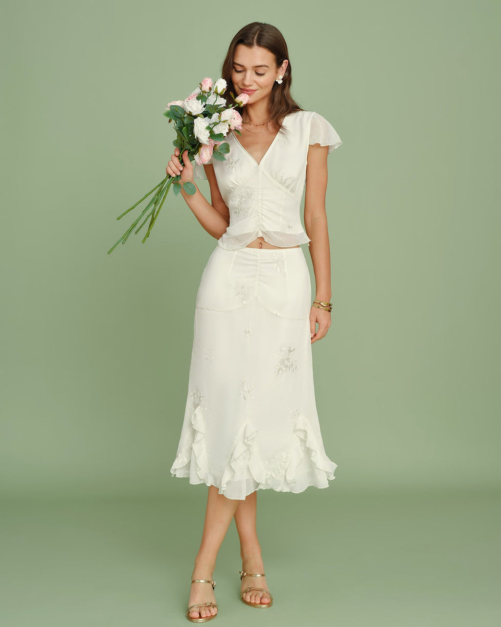Jupe midi couleur abricot avec broderies et volants