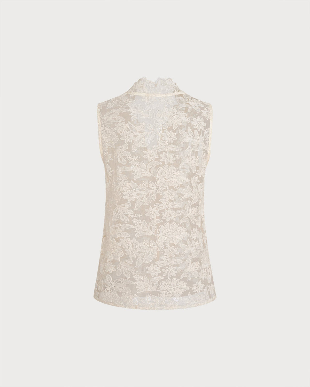 Débardeur transparent couleur abricot avec broderies florales