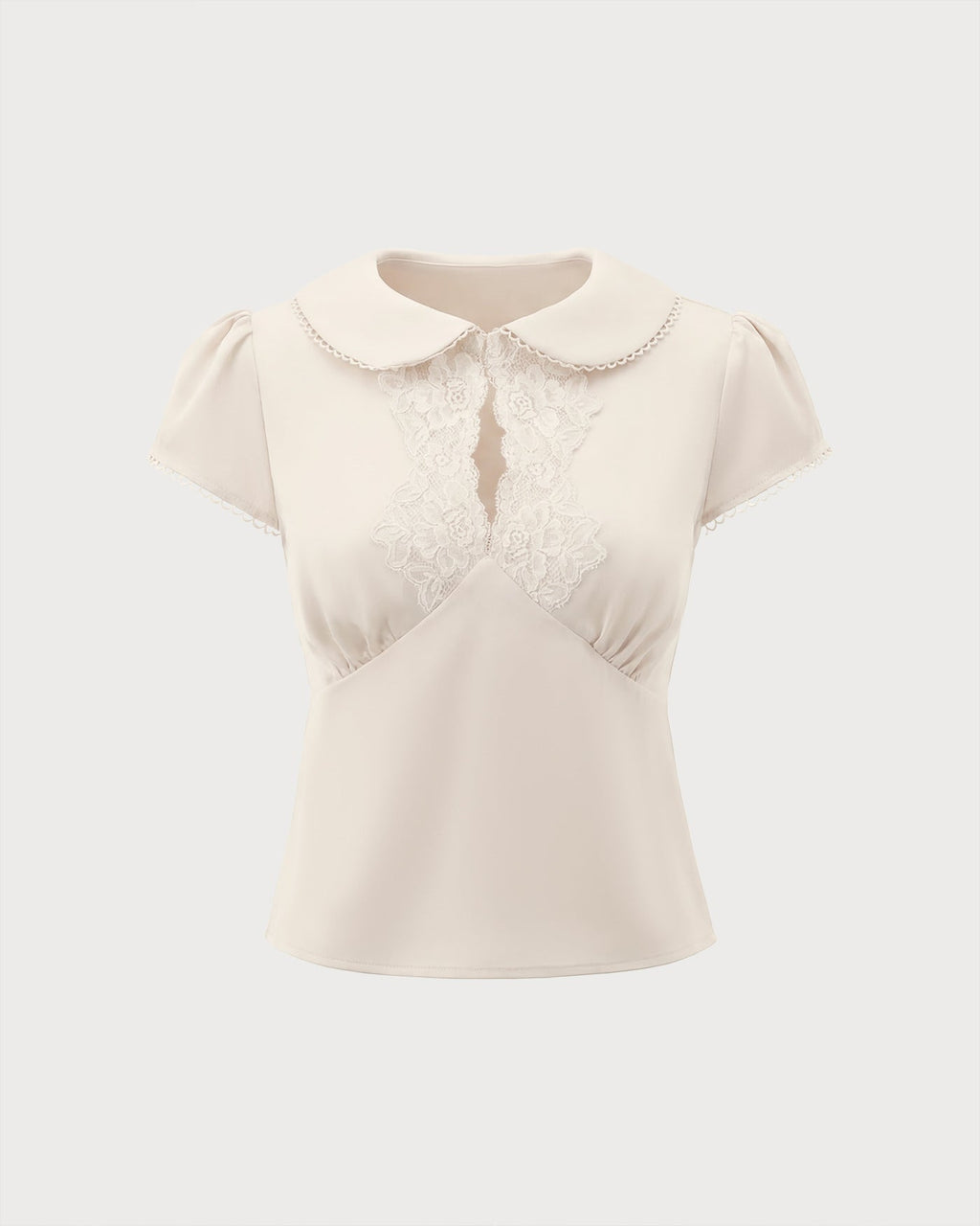 T-shirt couleur abricot avec col en dentelle et empiècements
