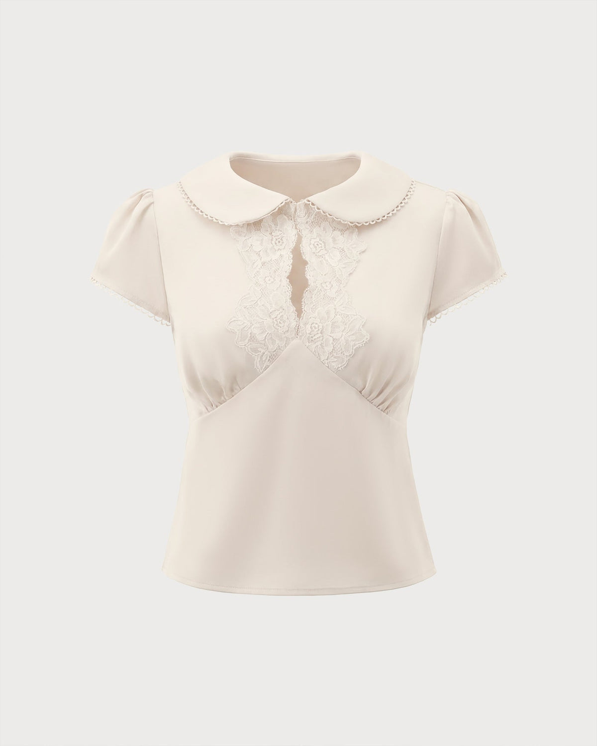 T-shirt couleur abricot avec col en dentelle et empiècements